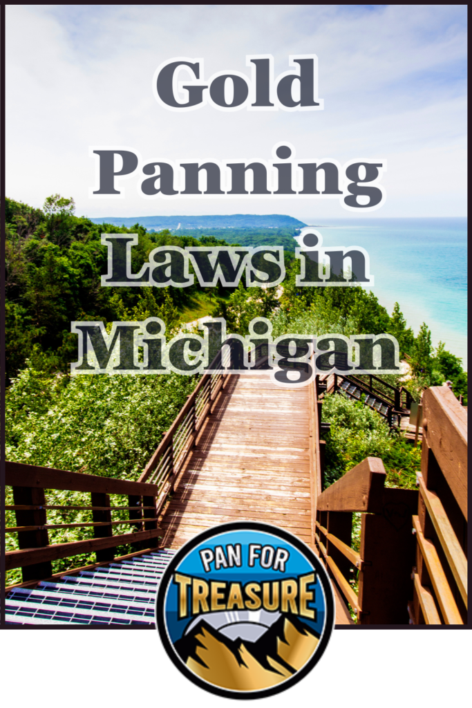 Wooden boardwalk descends through green trees to a blue lake under clear sky; text reads "Gold Panning Laws in Michigan," highlighting essential regulations for prospectors, with a "Pan for Treasure" logo at the bottom.
