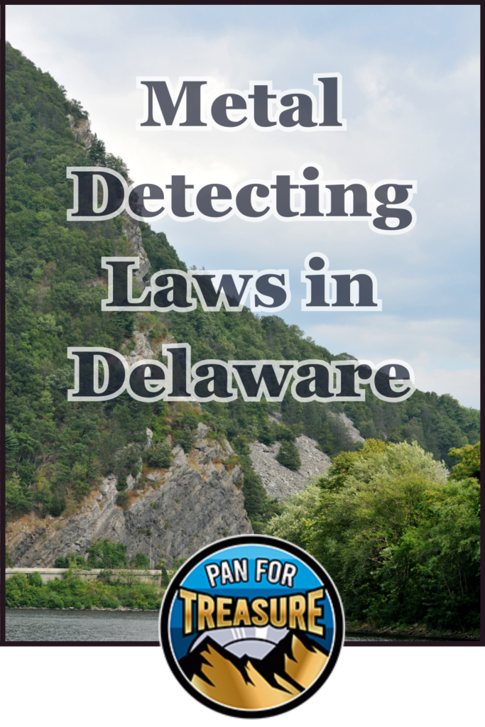 A forested hill beside a river features the text "Metal Detecting Laws in Delaware" with a "Pan for Treasure" badge at the bottom, capturing the adventurous spirit of exploring Delaware’s metal detecting regulations.