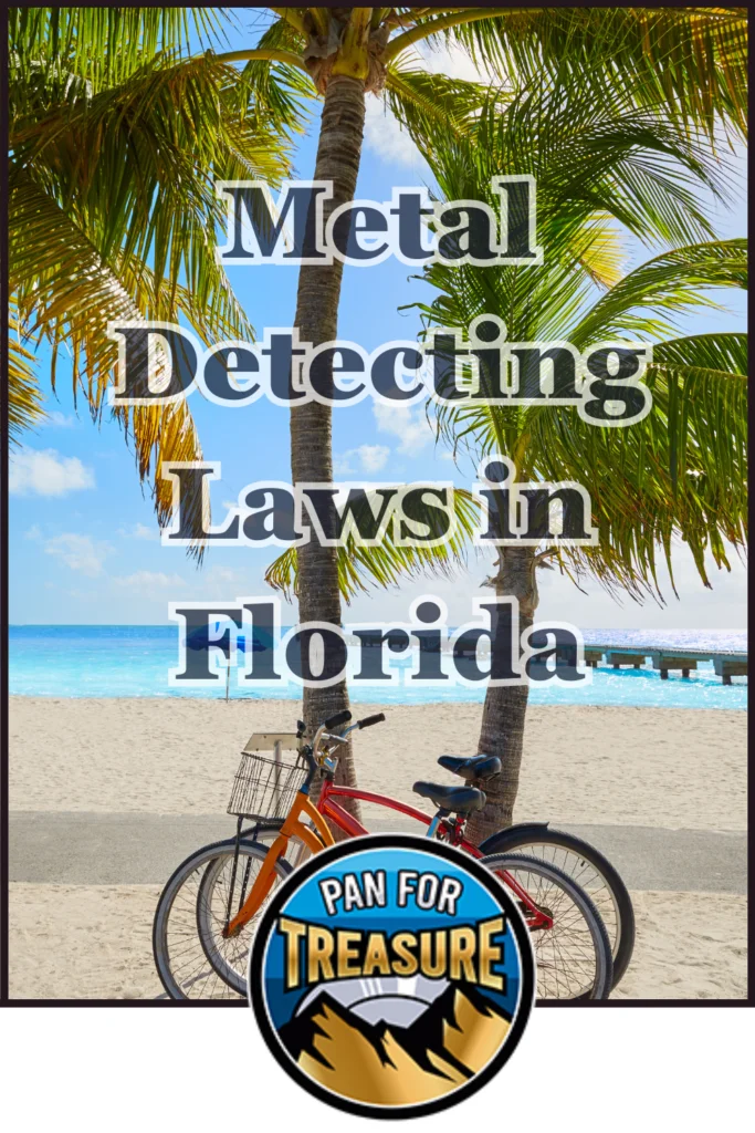 Two bicycles rest on a sandy beach beneath swaying palm trees, with a pier in the distance. "Metal Detecting Laws in Florida" is highlighted above the "Pan for Treasure" logo at the bottom.