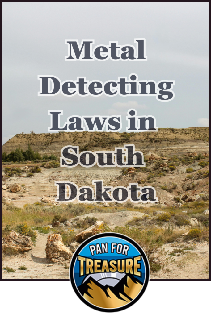 Text over a rocky, grassy landscape reads "Metal Detecting Laws in South Dakota," highlighting key South Dakota Metal Detecting Regulations. A round "Pan For Treasure" logo with mountains appears at the bottom.